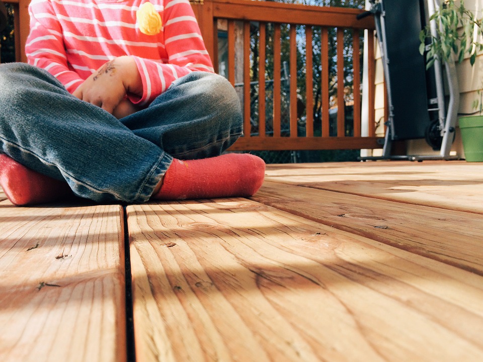Boy Sitting on Decking | eDecks